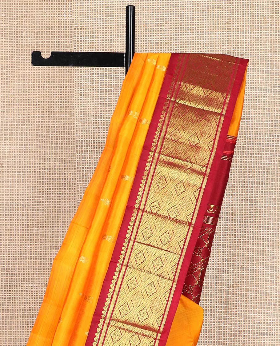 Mango yellow zari buttas kanchipuram silk saree, contrast one-sided korvai border of salngai,banaras & jaal & intricate pallu