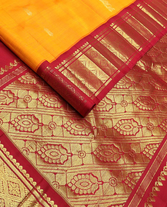 Mango yellow zari buttas kanchipuram silk saree, contrast one-sided korvai border of salngai,banaras & jaal & intricate pallu