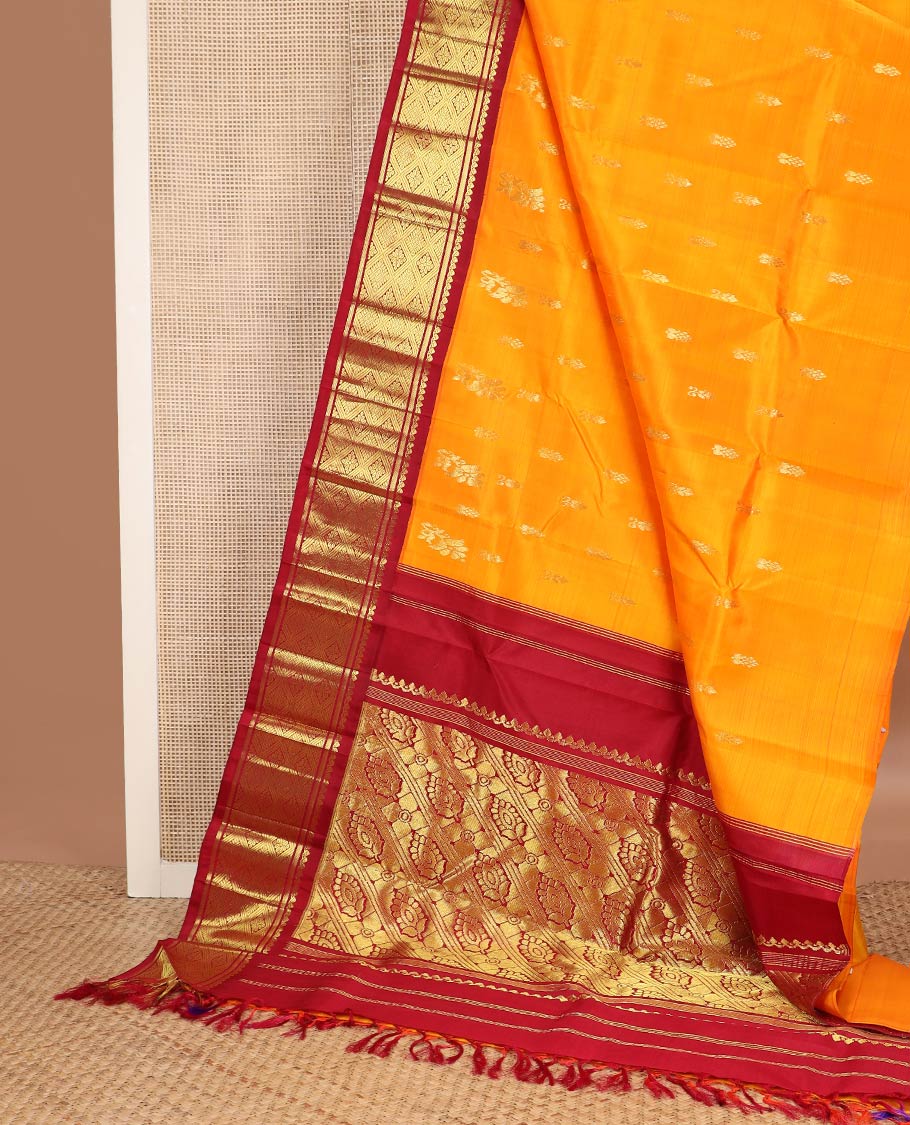 Mango yellow zari buttas kanchipuram silk saree, contrast one-sided korvai border of salngai,banaras & jaal & intricate pallu