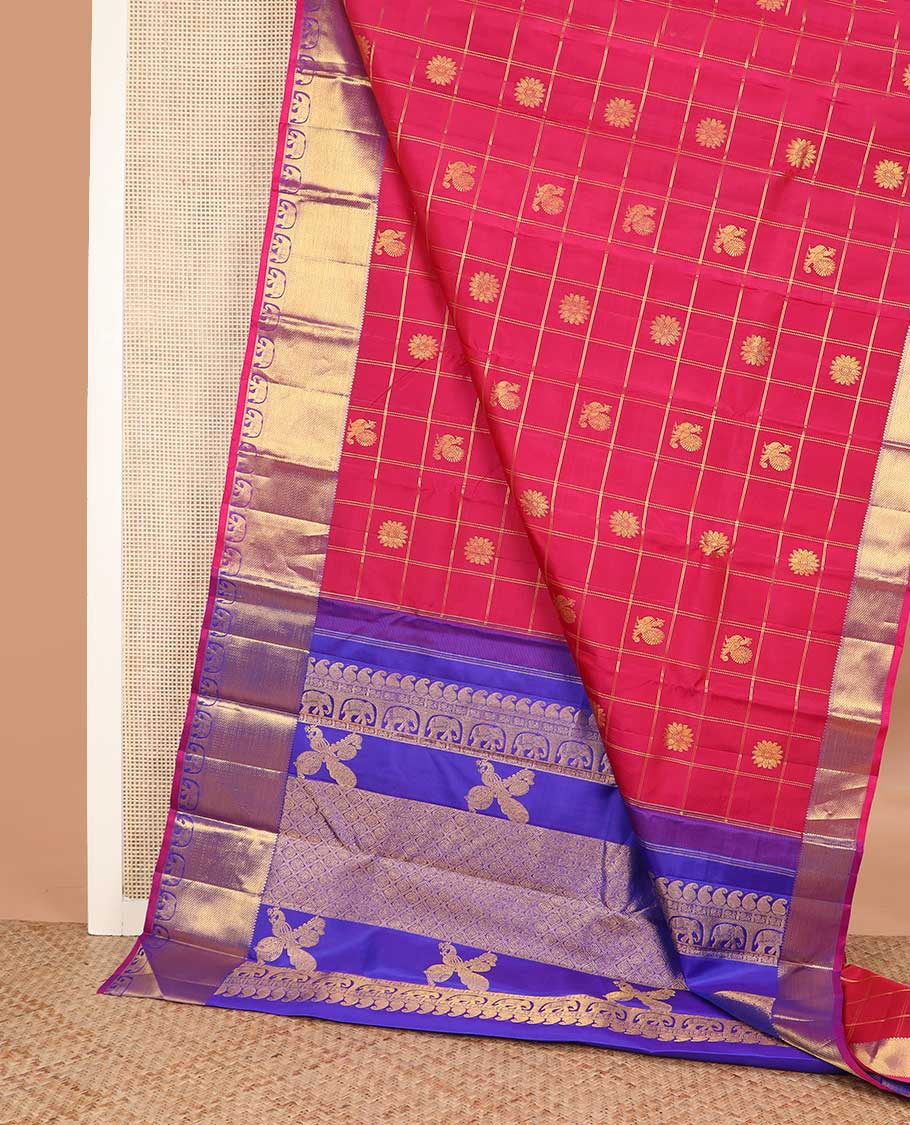 Red annam chakram buttas enclosed checked Kanchipuram silk saree, contrast border of rekku, muthu, mayil kann, and yaanai designs, and pallu of jaal, and peacock in the veena motifs
