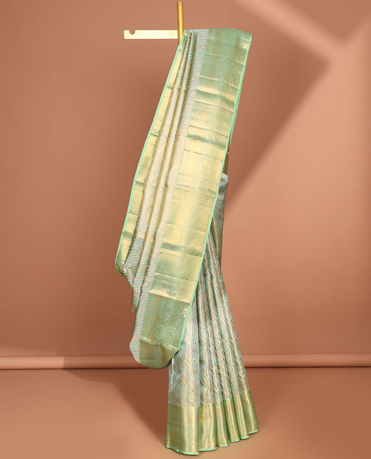 Green striped floral design kancheepuram tissue silk saree,contrast border of thilkam,poo chakram,banaras , manga & intricate pallu