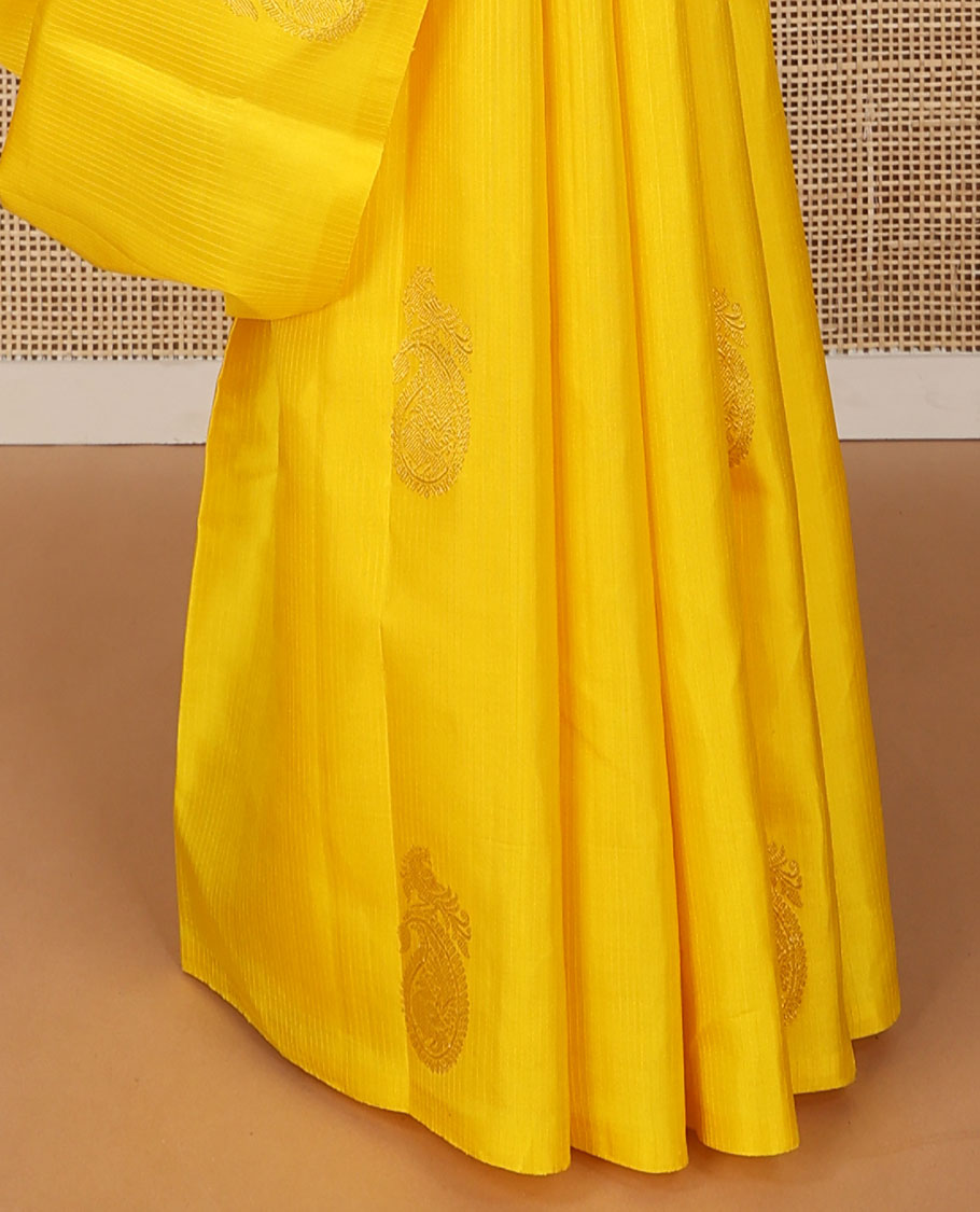 Borderless yellow animal design kancheepuram silk saree with floral jaal design pallu