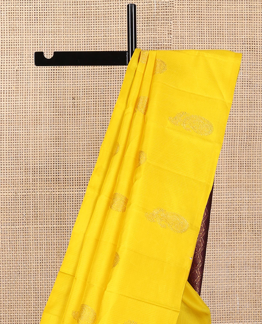 Borderless yellow animal design kancheepuram silk saree with floral jaal design pallu