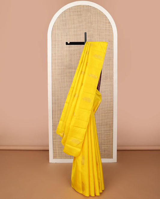 Borderless yellow animal design kancheepuram silk saree with floral jaal design pallu