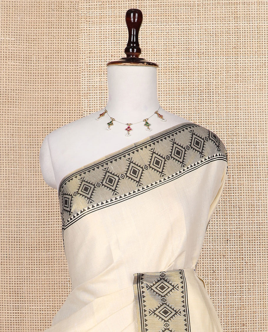 Cream plain design Kerala saree, contrast diamond patterned border, and diamond patterned pallu