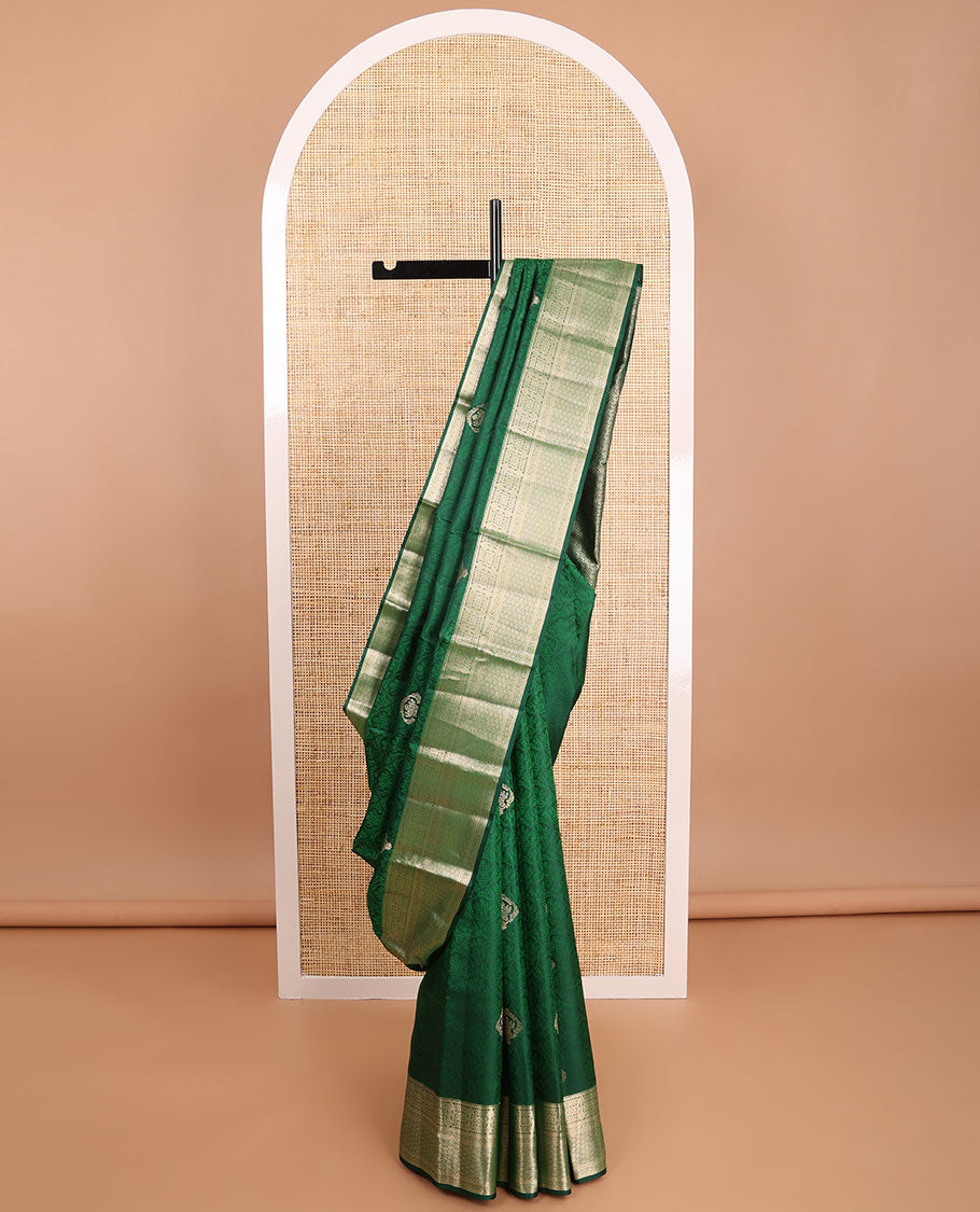 Bottle green floral jacquard kancheepuram silk saree with self floral design border & jaal design pallu