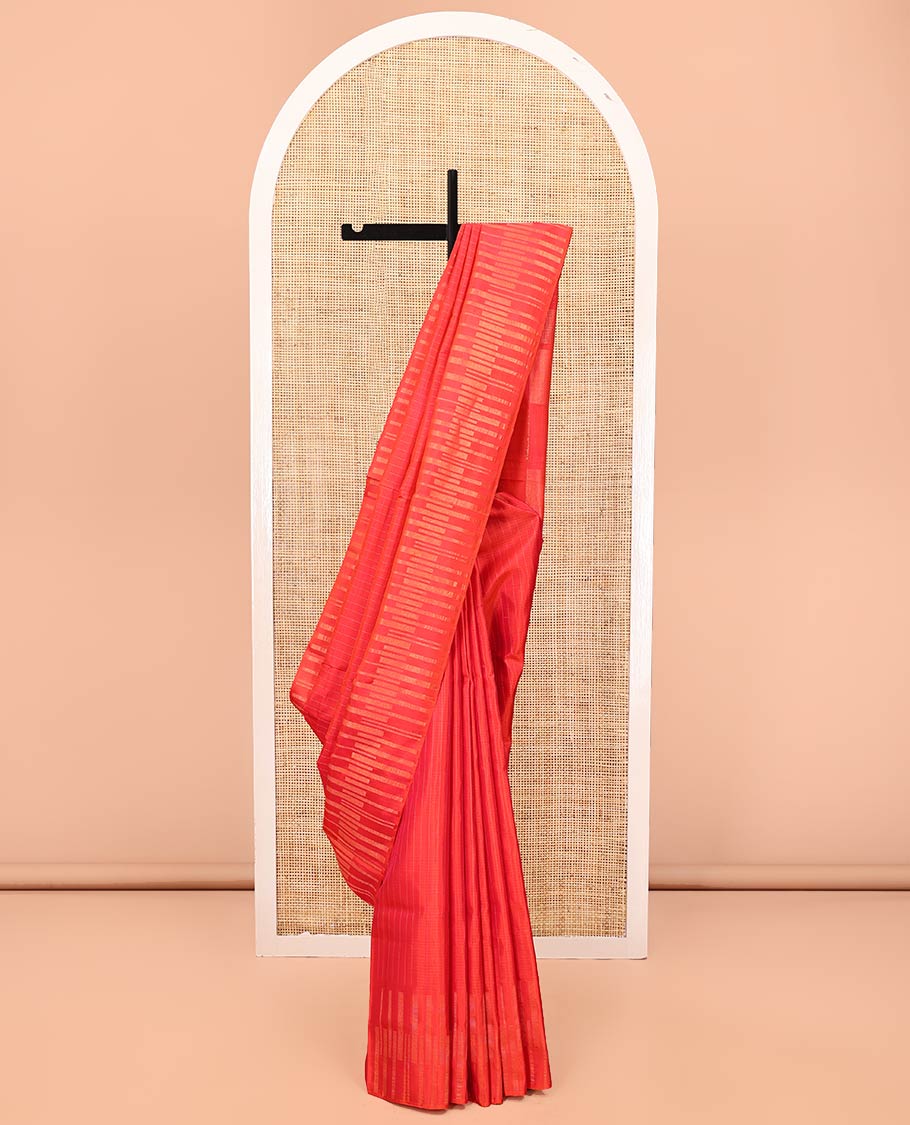 Red Mayuri Soft Silk Saree, Sparsely Sparkled with Stripes All Over Its Body, Highlighted by Zari Geometric Border, Pallu of Gleaming Zari Checks, and Paired with a Matching Blouse