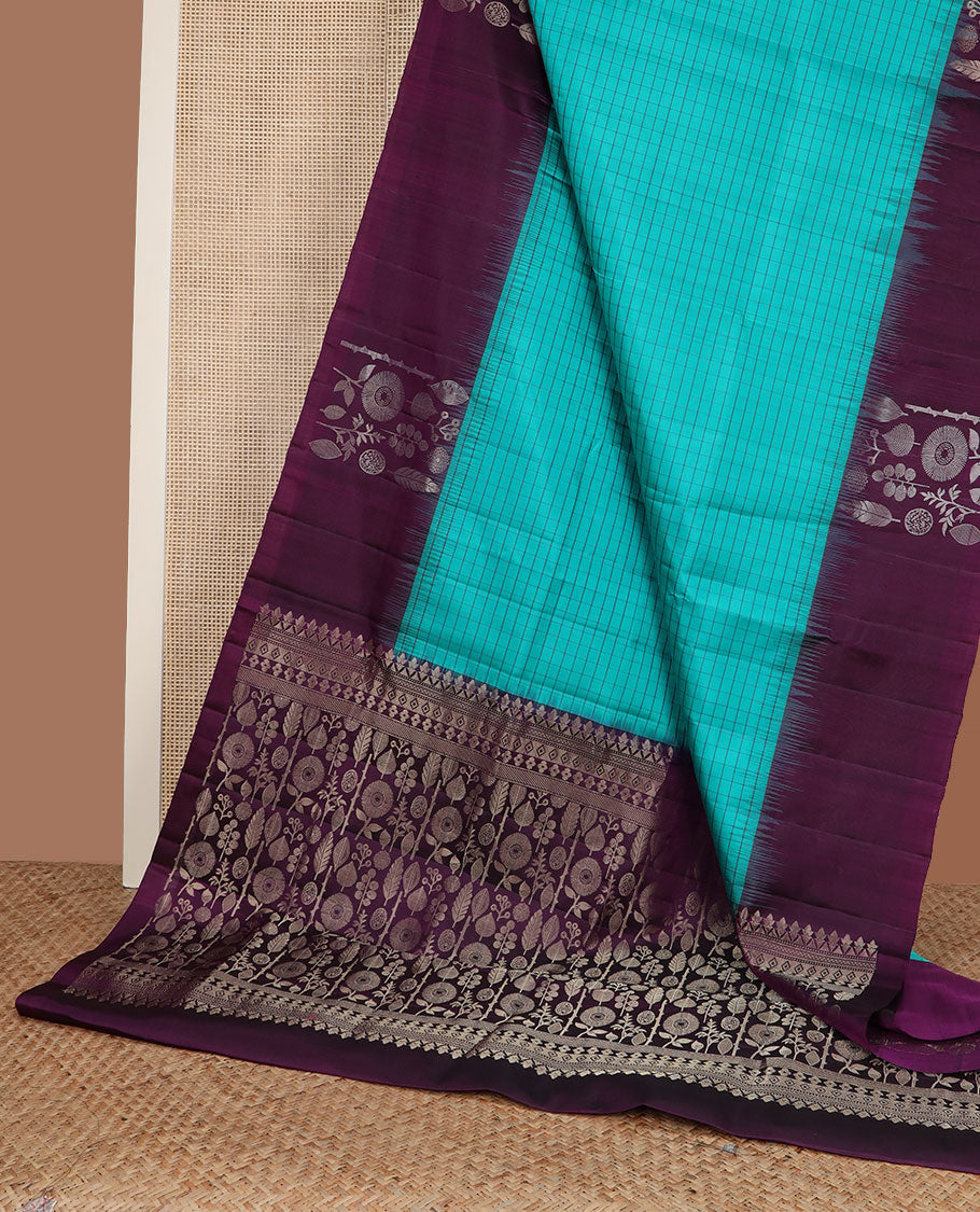 Blue checked soft silk saree, contrast unique-shaped floral & leaf motif border & pallu steeped with unique-shaped floral & leaf motifs