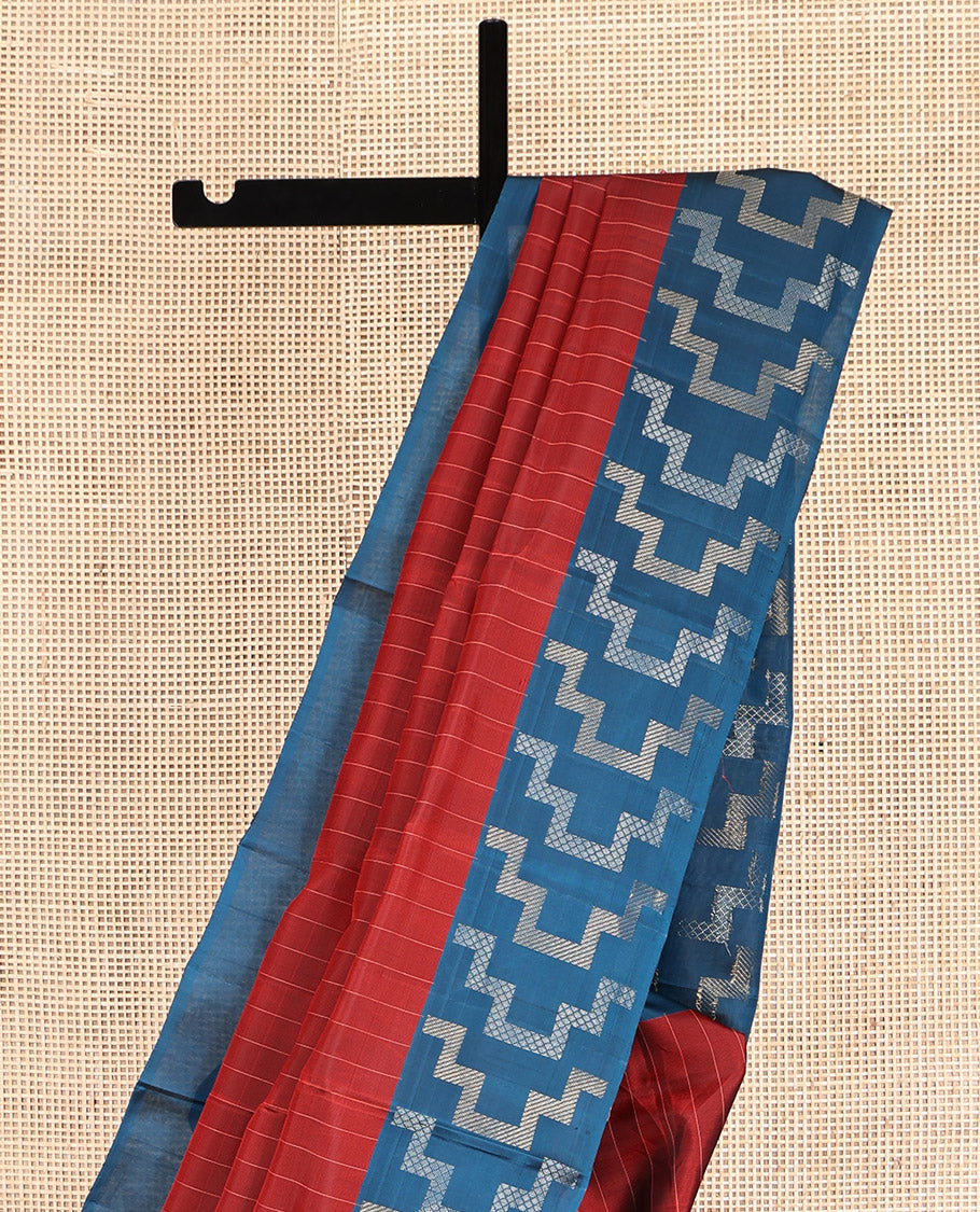 Rust Mayuri Lite Silk Mix Saree, Subtly Sparkled With Stripes, Complemented by Contrast Border, and Pallu of Geometric Patterns, and a Contrast Blouse