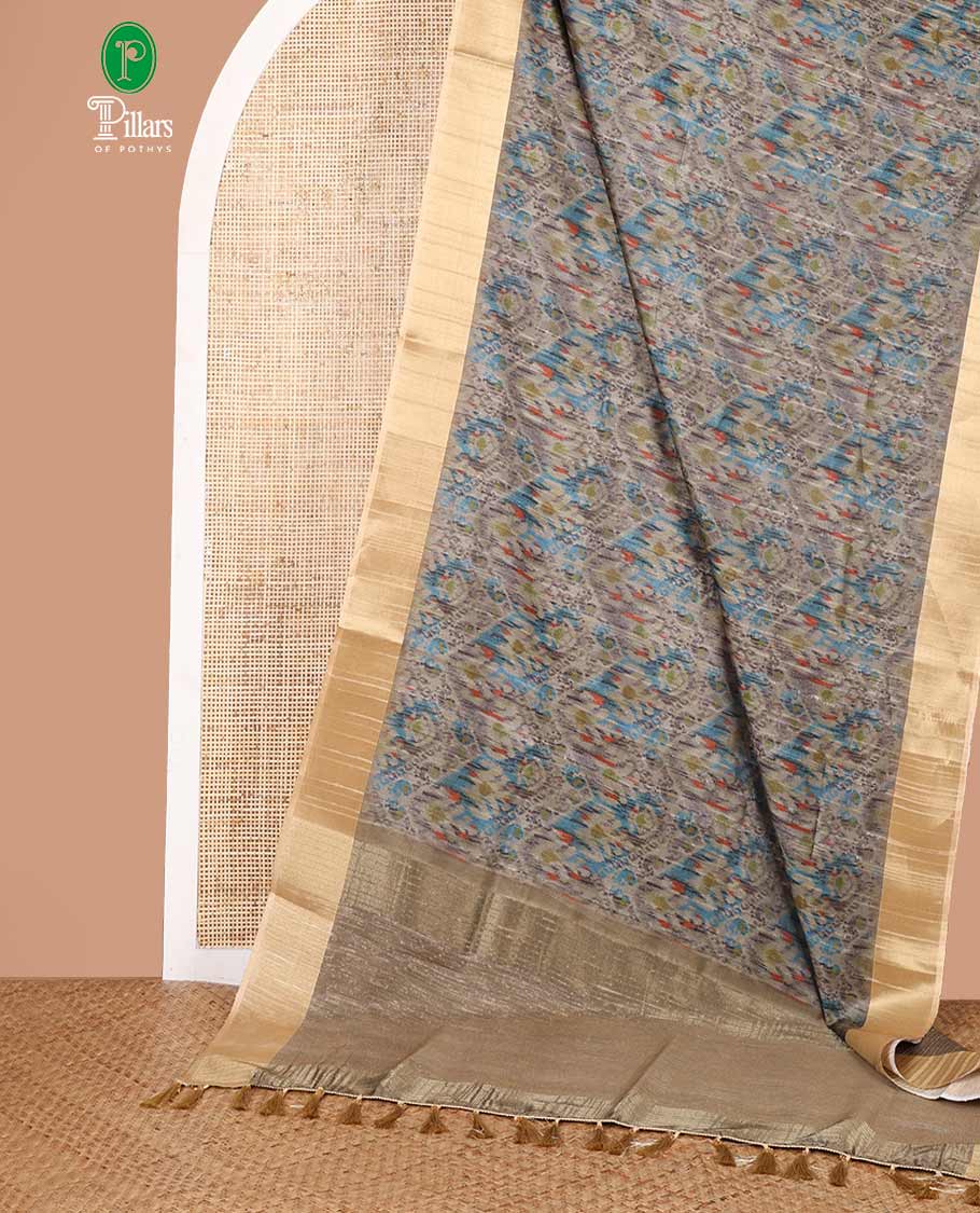Cream ikkat style printed khicha tussar saree with bawanchi border & jute weaving pallu along with printed blouse