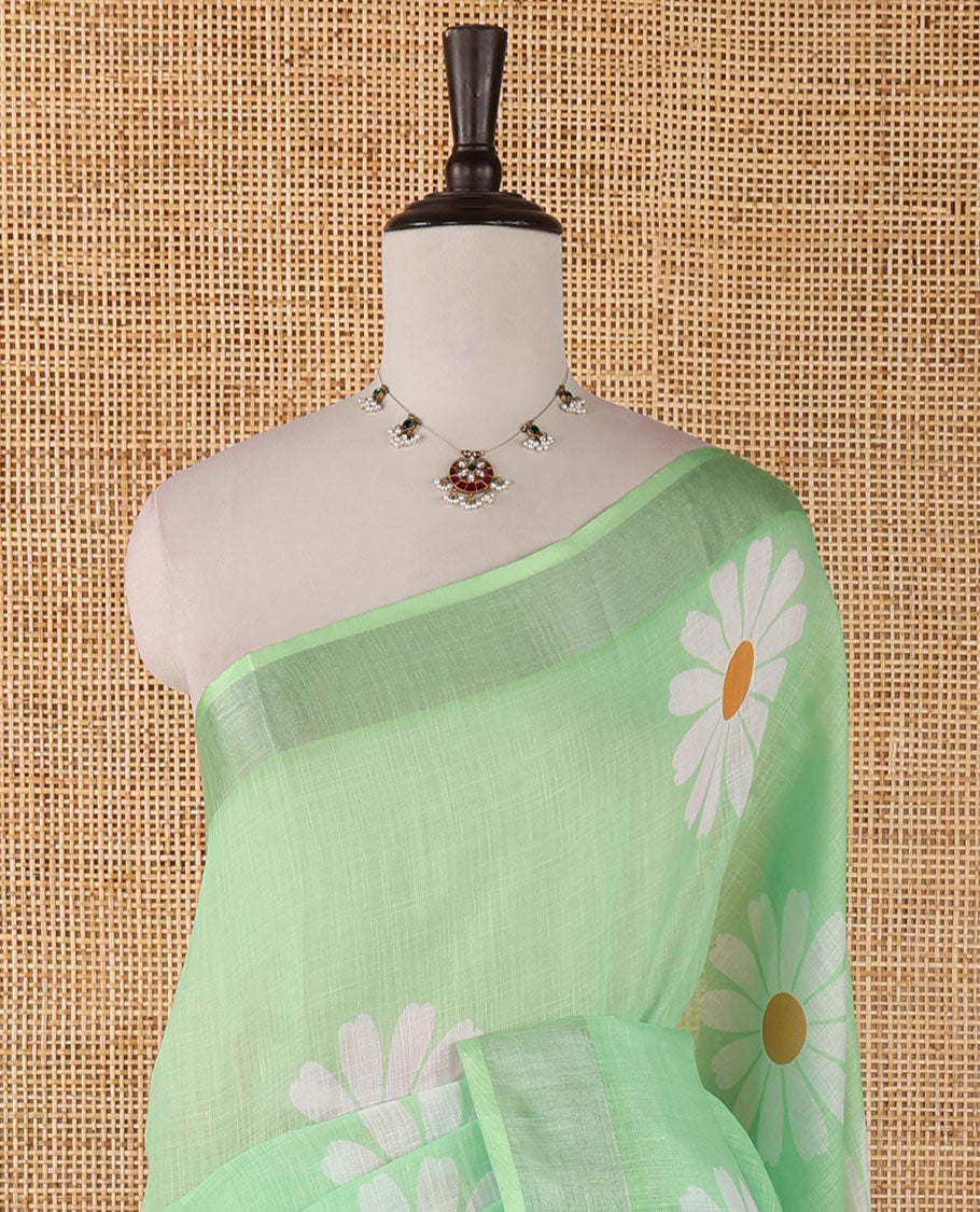 Sea green sunflower motif printed linen saree, silver zari plain border & small sunflower motif print blouse