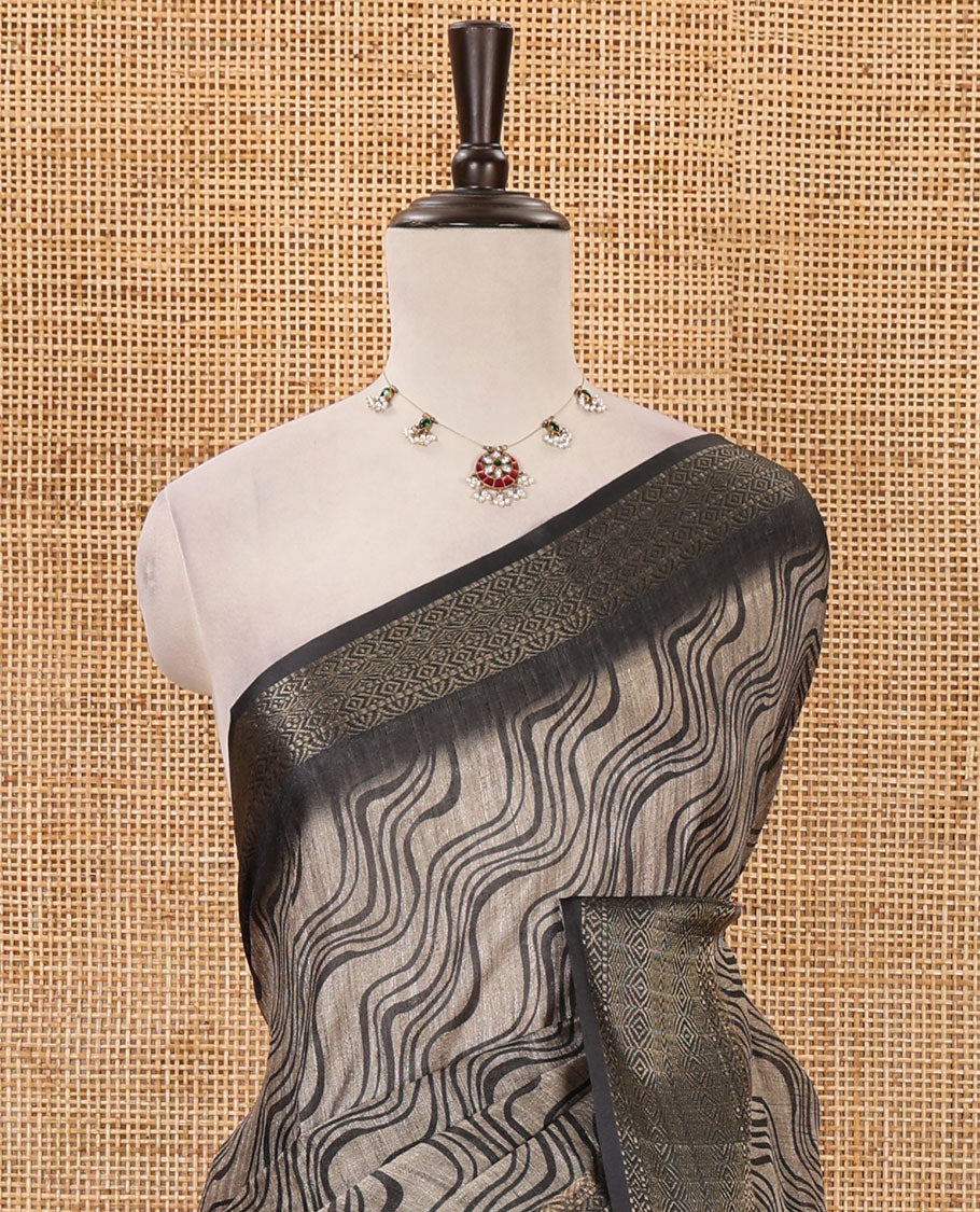 Chikku zig-zag stripes printed semi-jute saree, contrast geometric zari border, Madhubani-style printed pallu, & black blouse of print & zari work