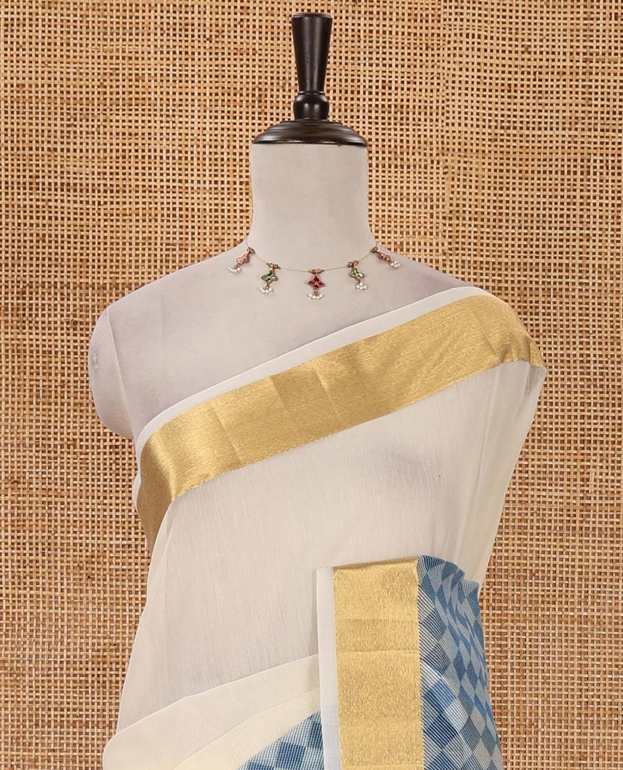 Cream with blue kerala cotton saree , diamond style printed with gold zari tissue bawanchi border & diamond pattern printed pallu with plain blouse