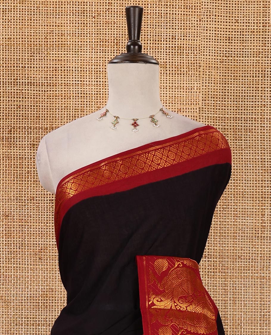 Black plain sungudi cotton saree, contrast big annam motifs woven zari border, zari striped pallu & zari design blouse
