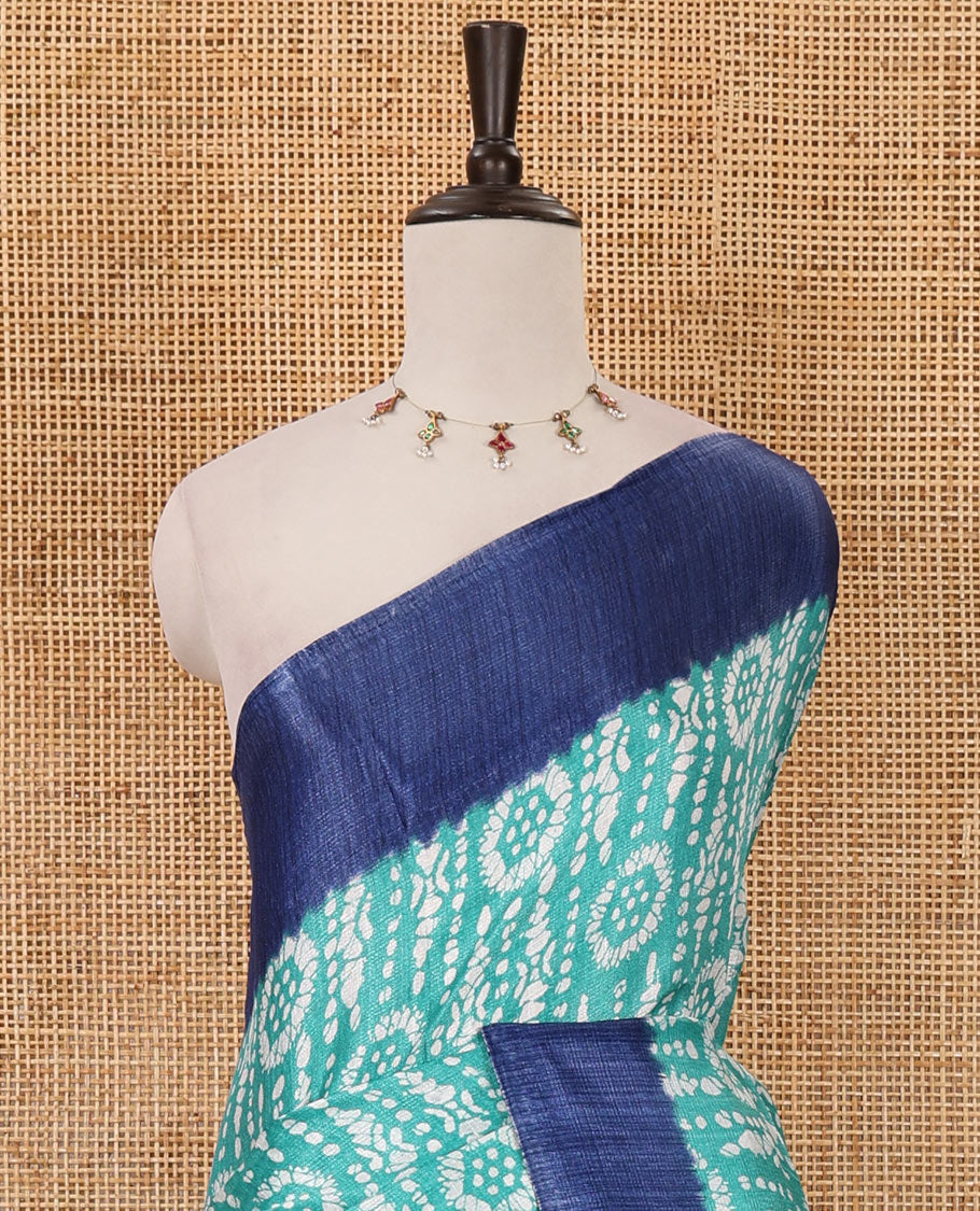 Rama green batik-style printed khadi cotton saree, contrast plain border, patola printed pallu & contrast plain blouse