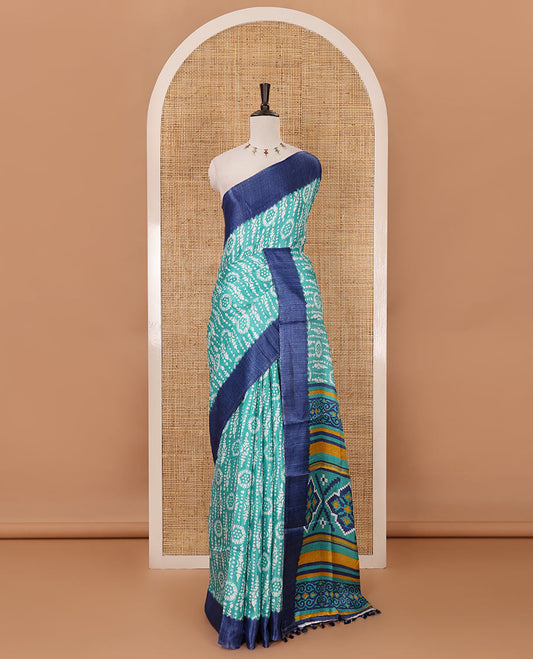 Rama green batik-style printed khadi cotton saree, contrast plain border, patola printed pallu & contrast plain blouse