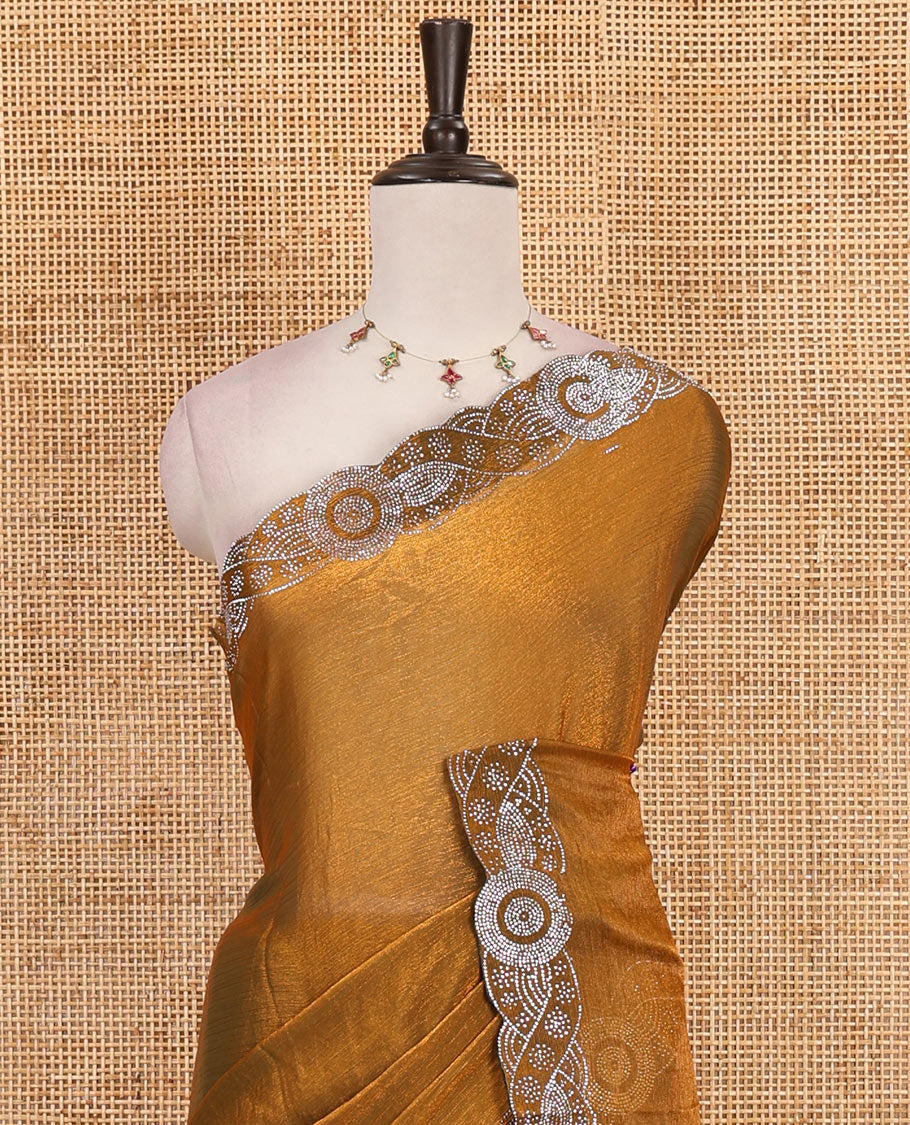 Mustard full-plain fendy chiffon saree, scallop swarovski stone work geometric border and contrast plain blouse