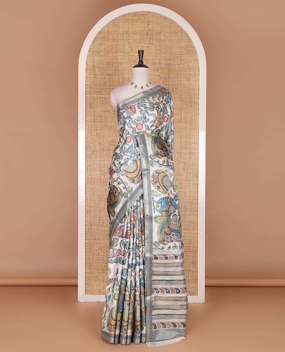 Cream-base multi-color kalamkari floral-vine and peacocks printed semi-tussar saree, gold zari piping border, kalamkari printed pallu, and contrast printed blouse