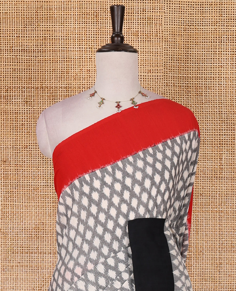 Half white jaal design ikkat cotton saree, contrast plain ganga jamuna border, ikkat jaal pallu, and contrast plain blouse