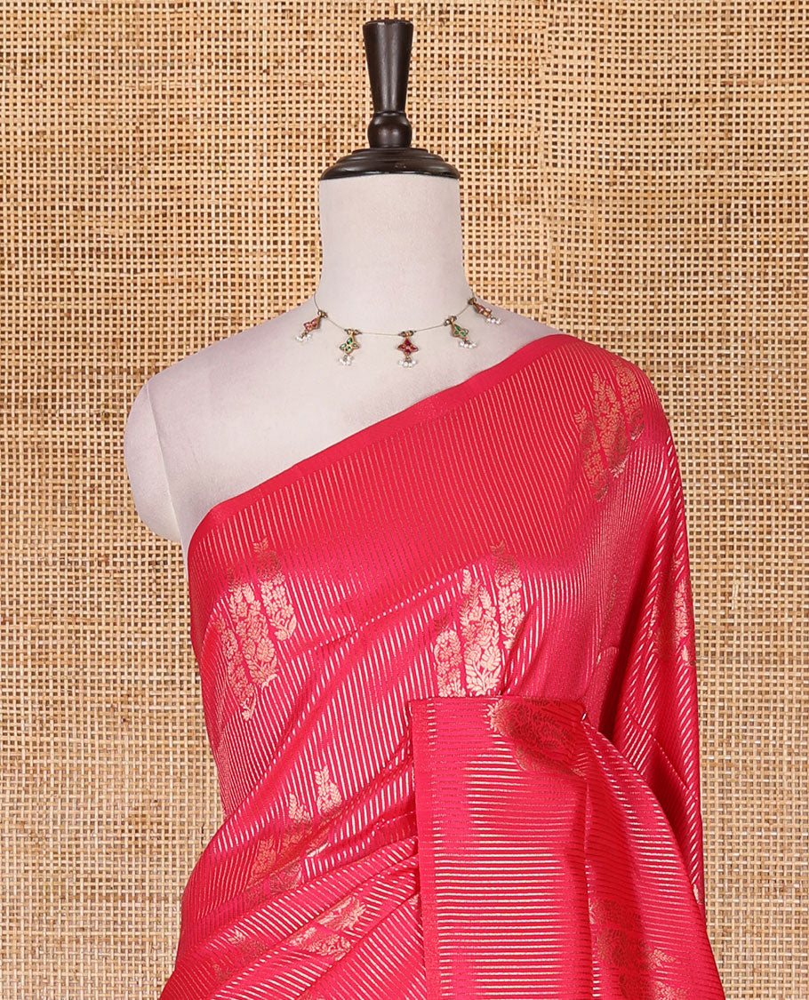Borderless pink stripes and zari floral buttas elite soft silk saree, contrast ogee patterned zari pallu, and contrast zari design blouse