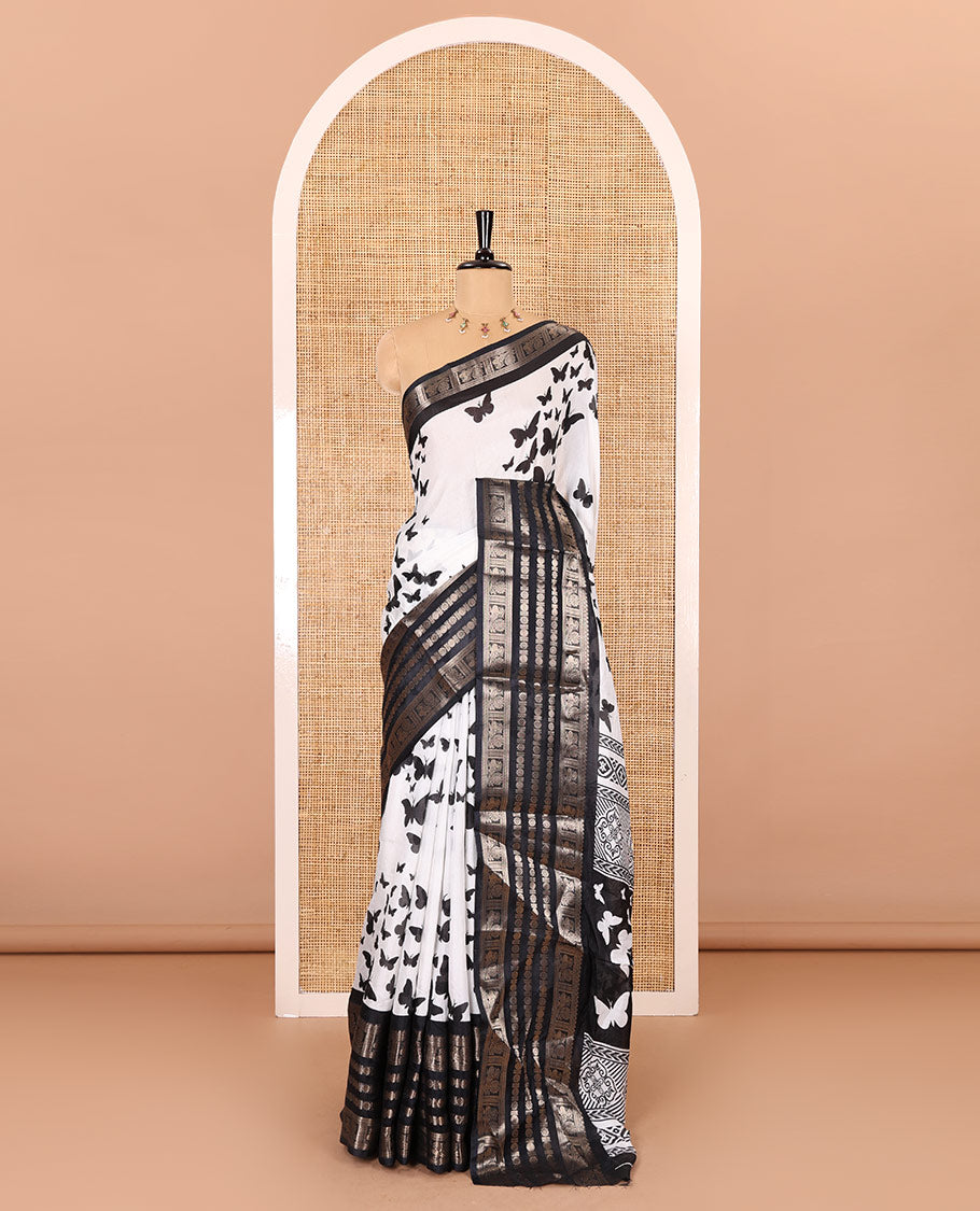 White and black butterflies printed dola silk saree, contrast traditional zari border, printed pallu, and a contrast plain blouse