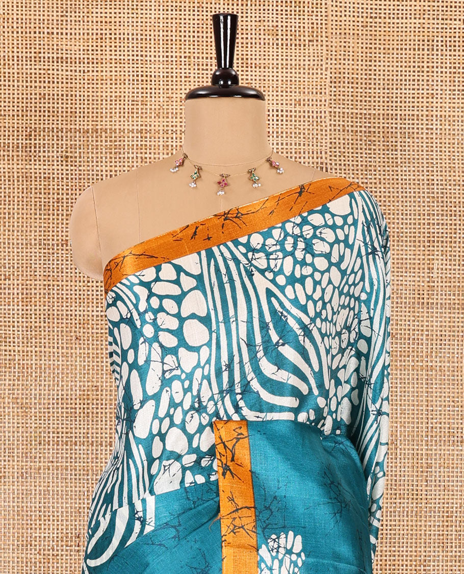 Peacock blue batik printed art Khadi cotton saree, batik printed border, batik printed pallu, and a contrast batik printed blouse
