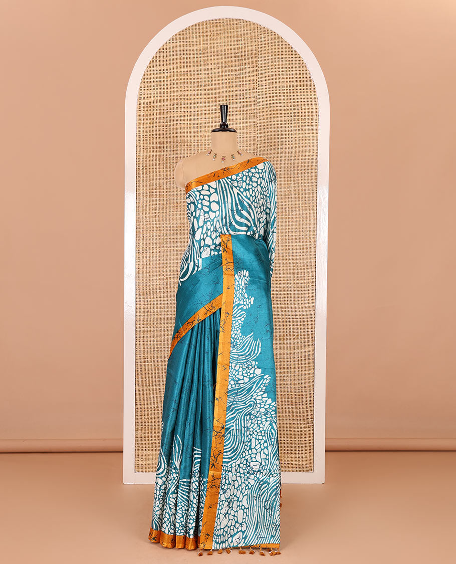 Peacock blue batik printed art Khadi cotton saree, batik printed border, batik printed pallu, and a contrast batik printed blouse