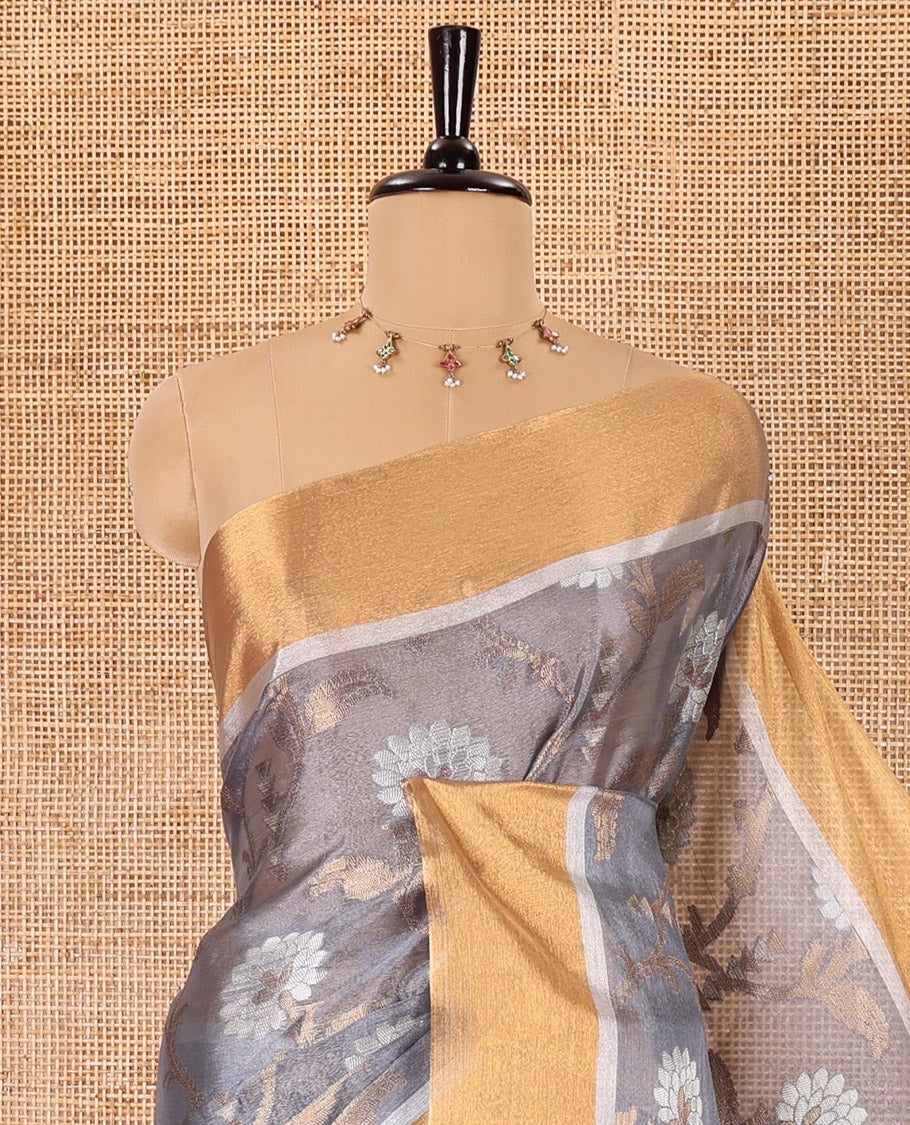 Grey floral jaal jacquard tissue silk saree, contrast bavanji border, floral design pallu, and a scallop design blouse