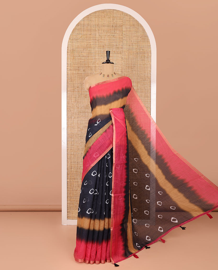 Black bandhani motifs printed linen cotton saree, tri-color dye print and piping zari border, printed pallu, and a matching blouse
