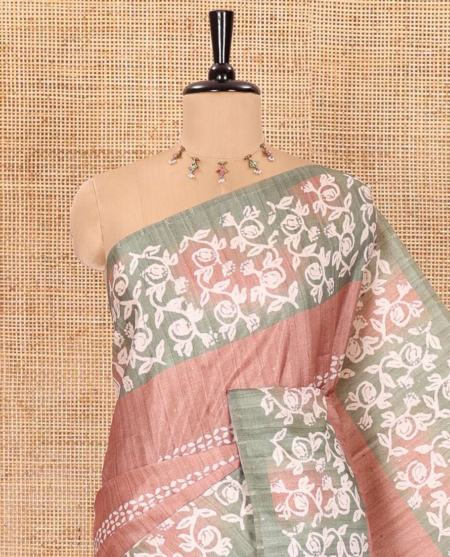Light brown sparkling dots and batik printed semi-tussar saree, contrast batik printed floral vine border, printed pallu, and a contrast printed blouse