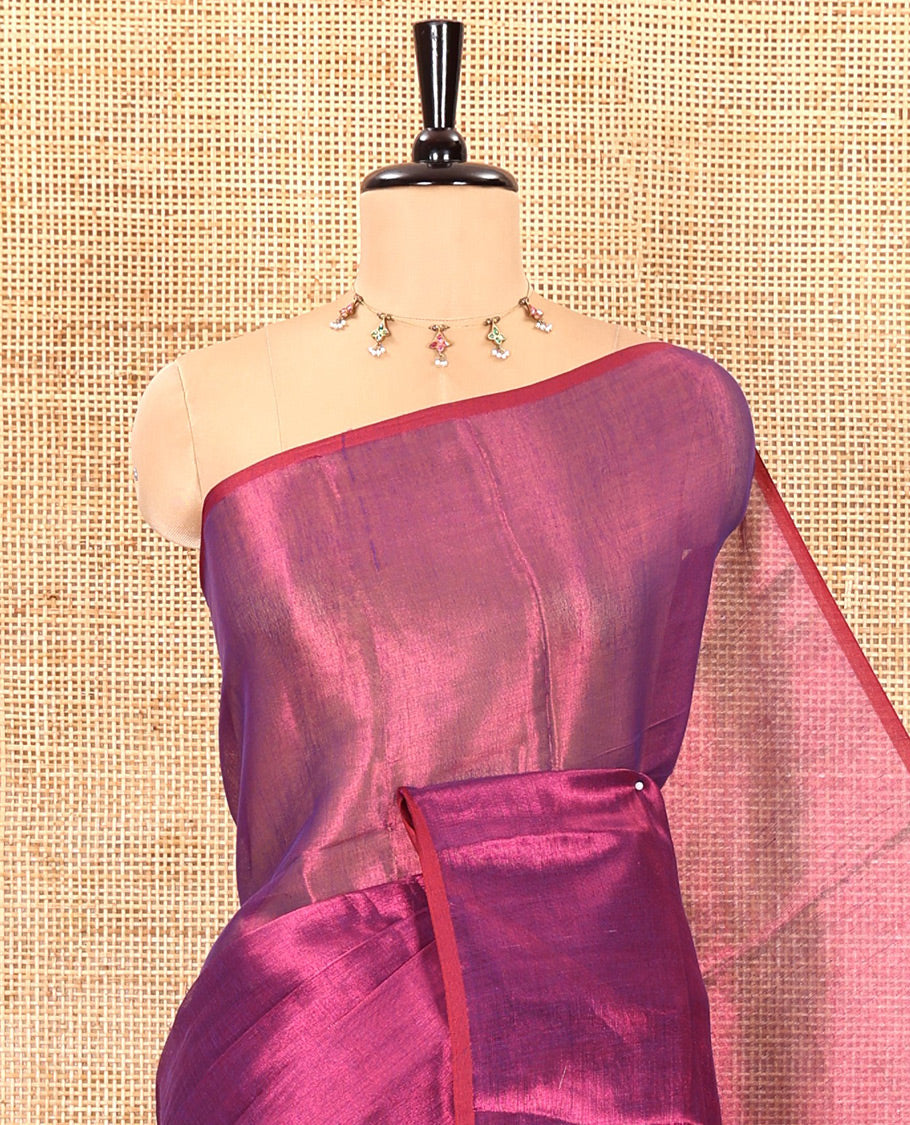 Borderless purple plain khadi tissue saree self pallu with tassels and a matching blouse
