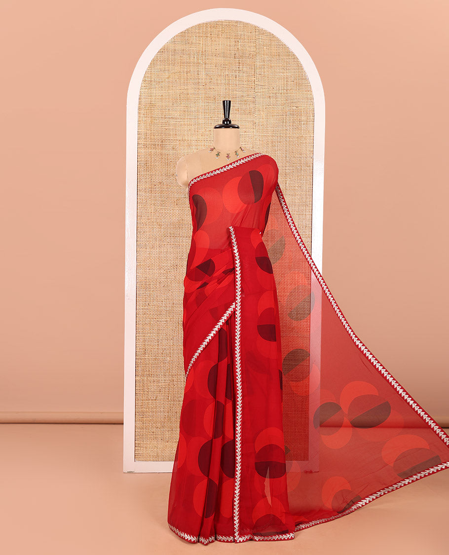 Red Georgette Saree Colorfully Printed with Leheriya-Style Stripes, Subtly Temple Motifs Sequin Embroidered Piping Border, and Paired with a Matching Diamond-Patterns Printed Blouse