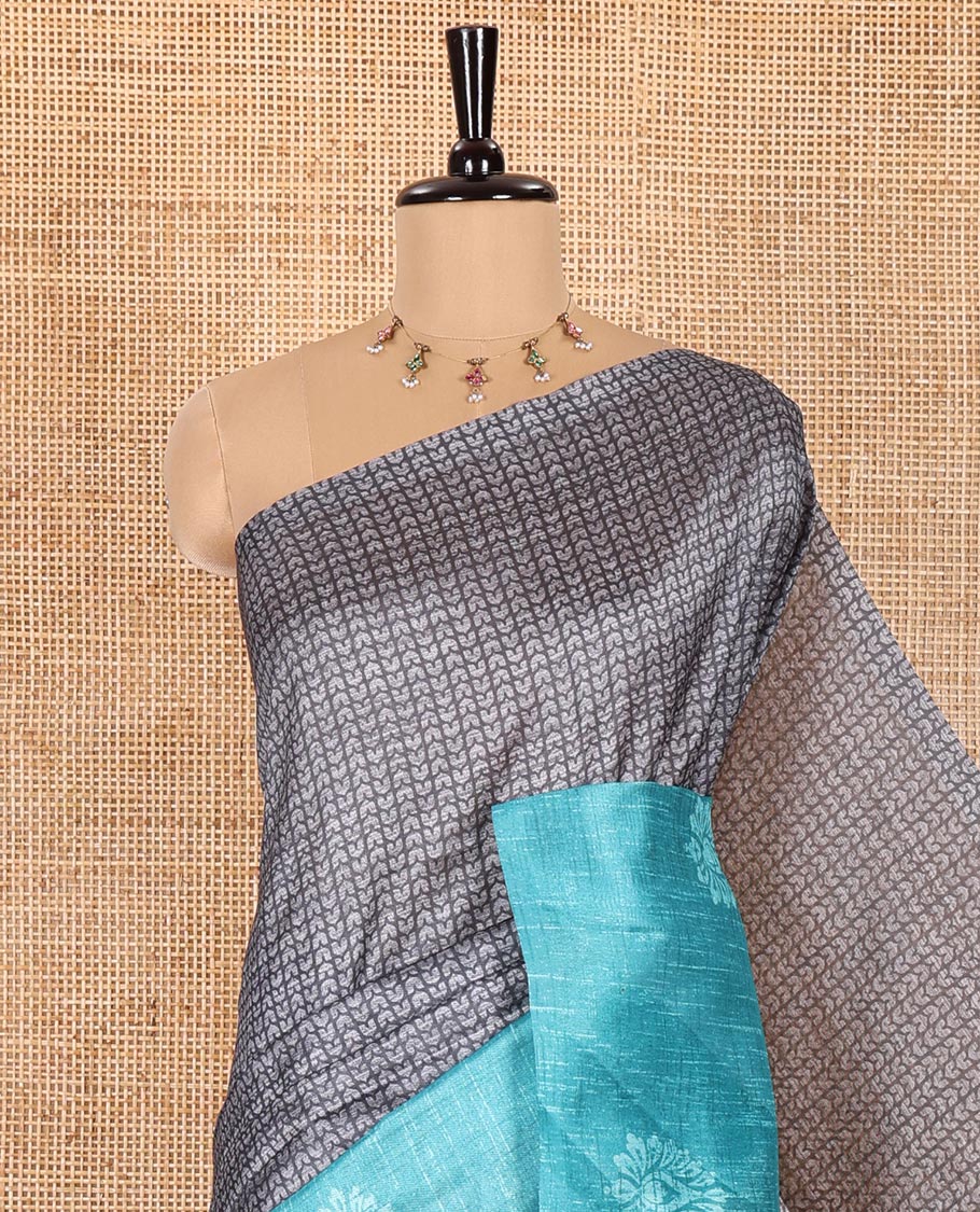 Grey and Rama Semi-Tussar Saree, Prettified with Geometric Patterns Printed All Over Its Body, Complemented by a Captivating Contrast One-Sided Border of Unique Print, and Paired with a Contrast Blouse