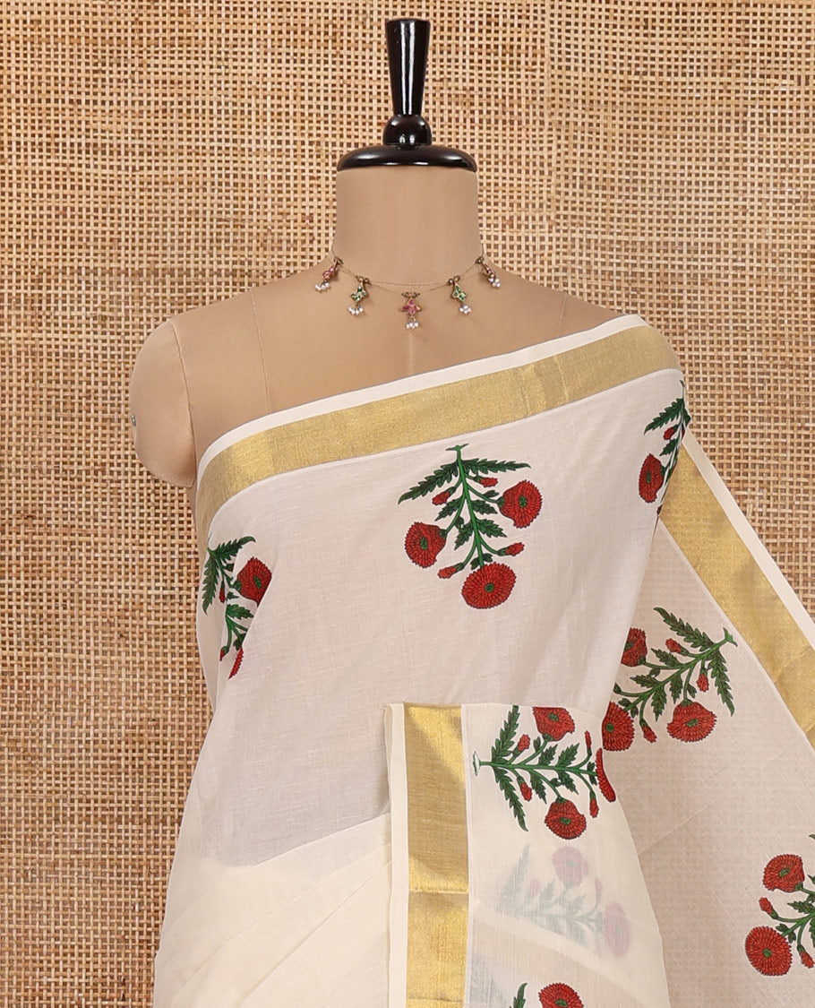 Cream Kerala Cotton Saree, Delicately Printed with Bunch of Floral Motifs Printed on Its Body, Subtle Zari Border, Pallu Features a Big Bunch of Floral Motifs Print, and Paired with a Matching Printed Blouse