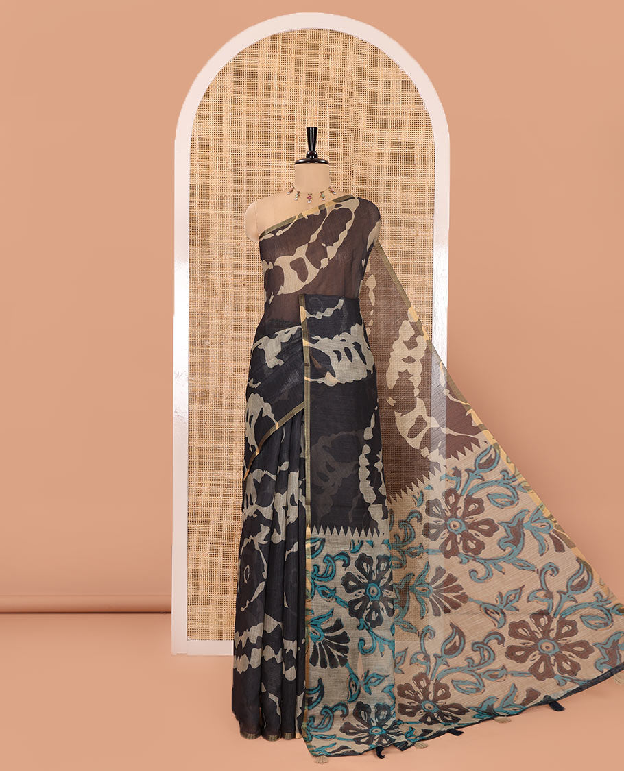 Black Linen Saree, Accentuated with Abstract-Style Print on Its Body, Subtle Piping Border, Captivating Pallu of Floral Vine Print, and Paired with a Contrast Floral Printed Blouse