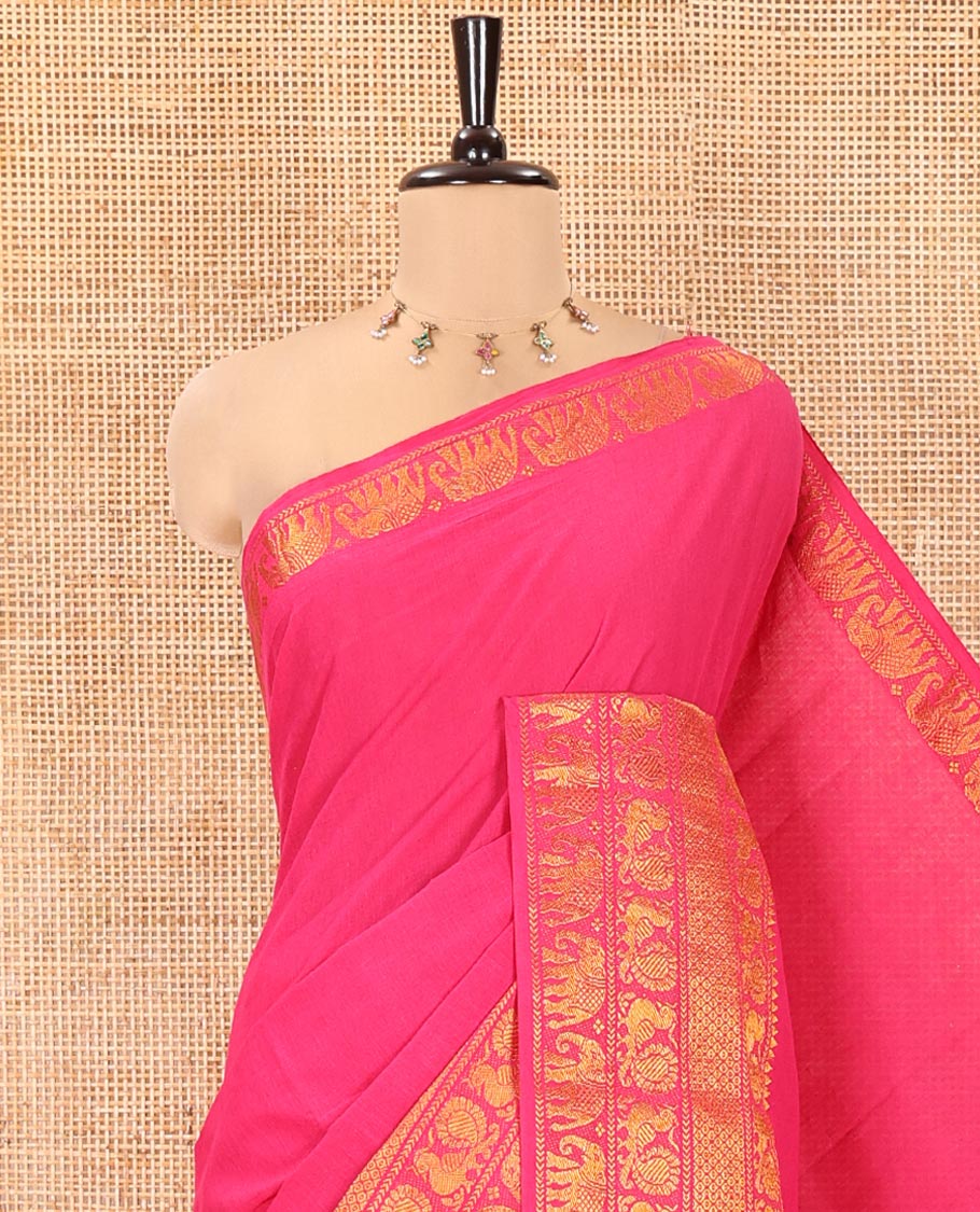 Rani Pink Plain Sungudi Cotton Saree, Highlighted by Traditional Zari Border of Peacock and Elephant Motifs Weave, Subtly Striped Pallu, and Paired with a Contrast Veldhari Design Blouse