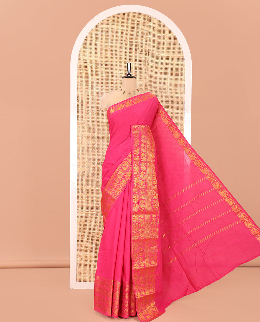 Rani Pink Plain Sungudi Cotton Saree, Highlighted by Traditional Zari Border of Peacock and Elephant Motifs Weave, Subtly Striped Pallu, and Paired with a Contrast Veldhari Design Blouse