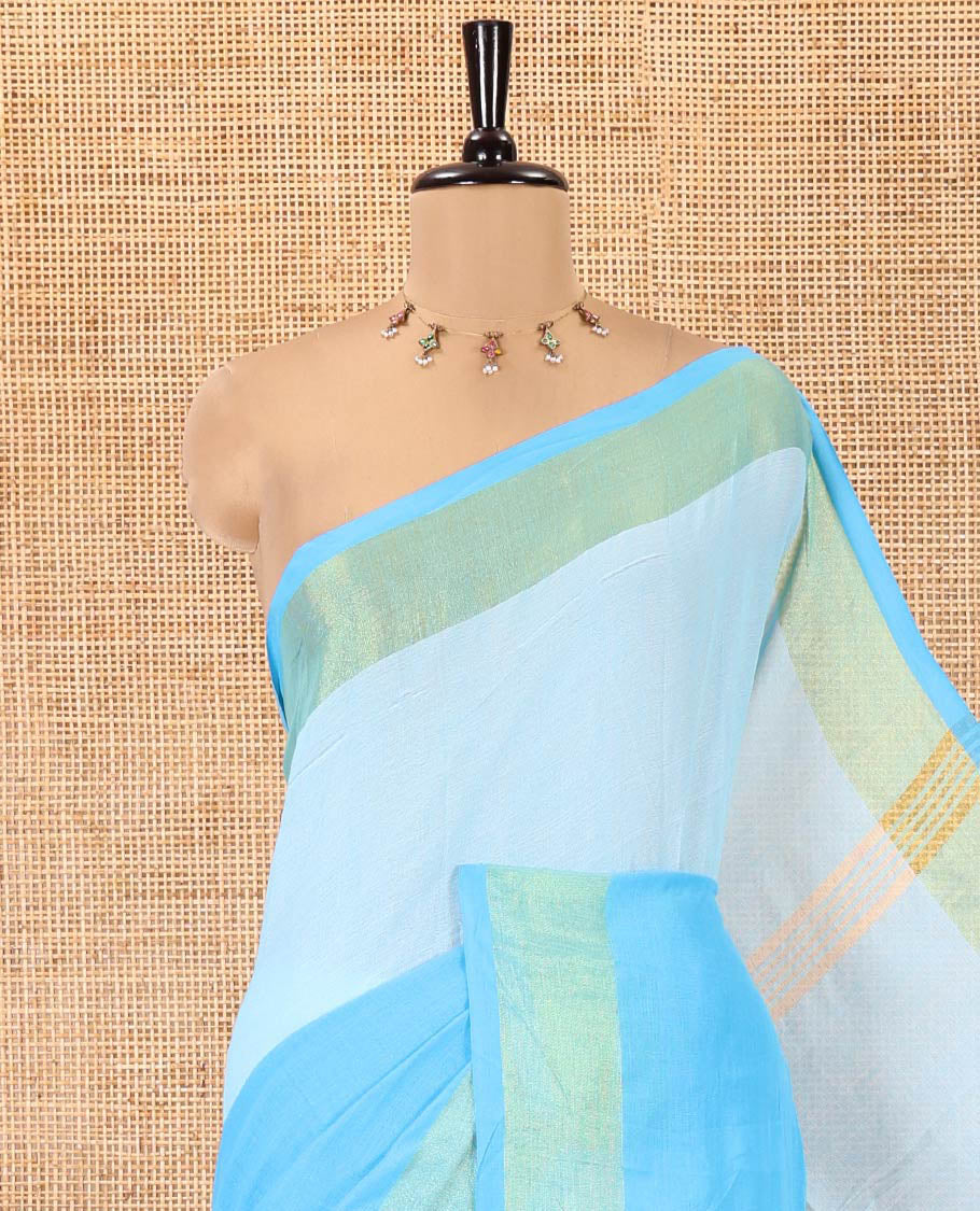 Blue Khadi Mul Cotton Saree, Adorned with Half-And-Half-Style Double-Colour Dyed on Its Body, a Subtle Zari Border, Striped Pallu, and Paired with a Matching Blouse
