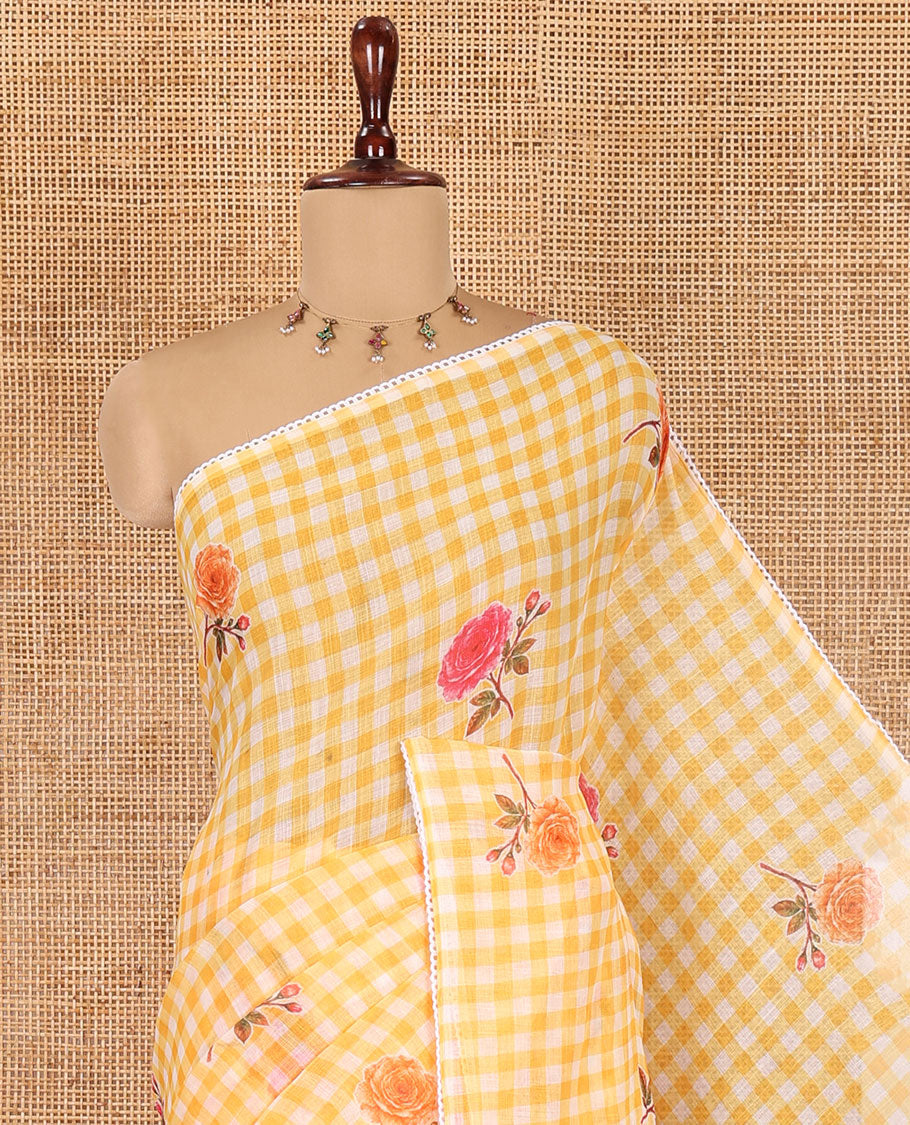 Yellow Linen Cotton Saree, Adorned with Checks and a Floral Print, Lace Border, a Self-Pallu, and a Contrast Blouse