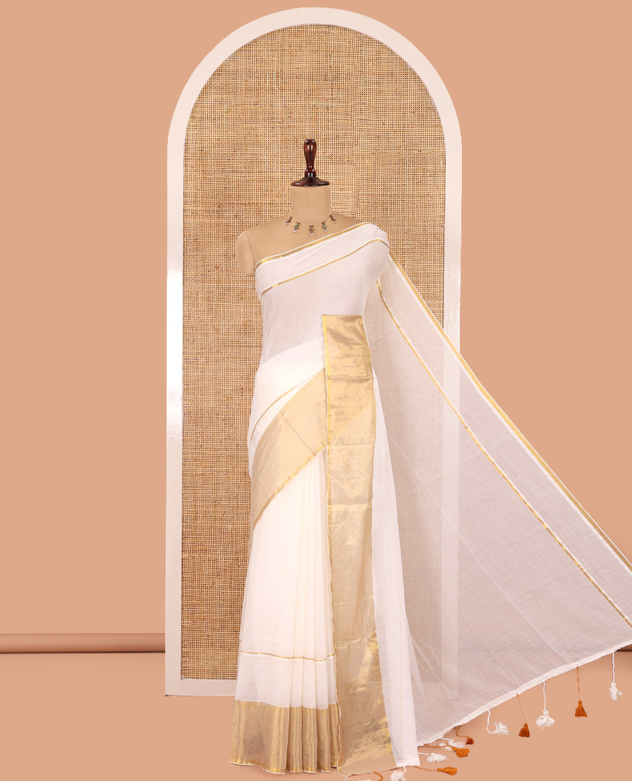 Cream Plain Khadi Mul Cotton Saree, Golden Zari Border, a Self-Pallu with Tassels, and No Blouse