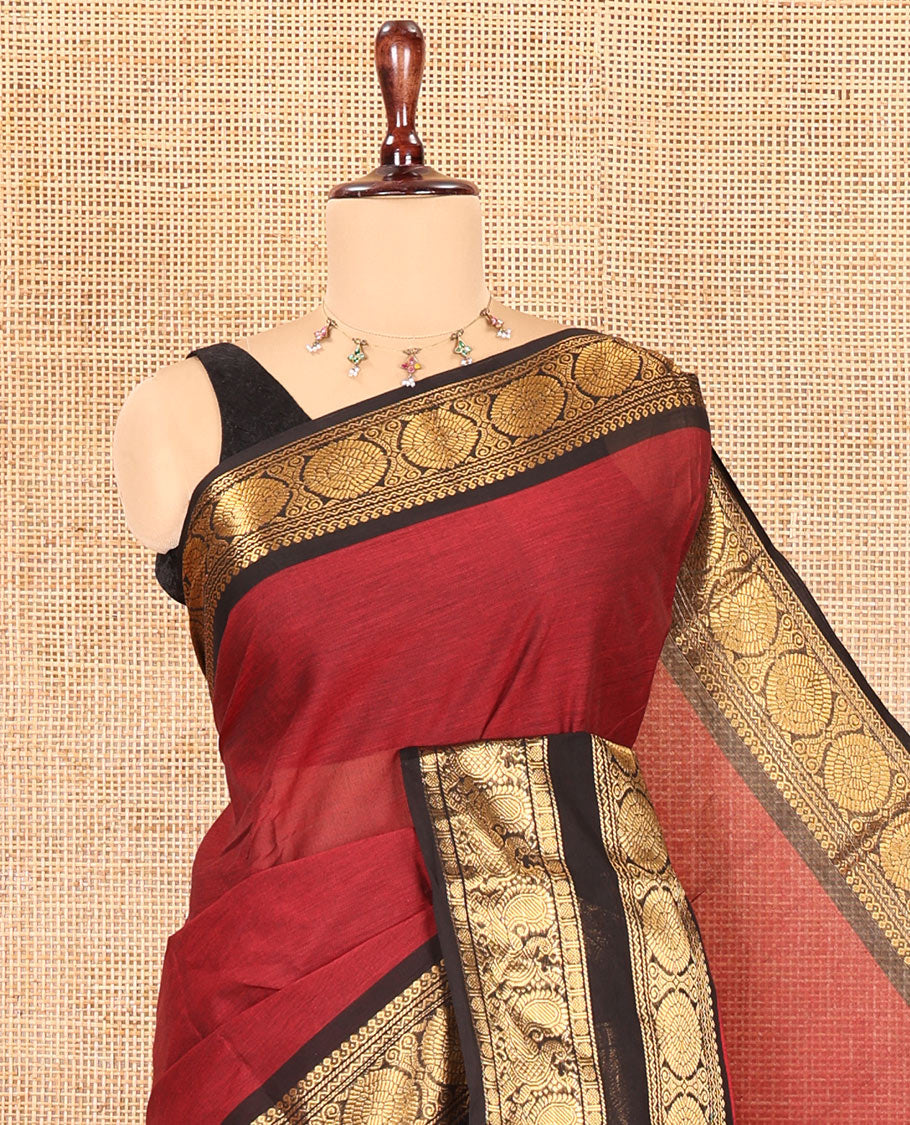 Maroon Chettinad Cotton Saree, a Contrast Peacock-Chakra Rettai Pettu Border, Striped Pallu, and Matching Blouse