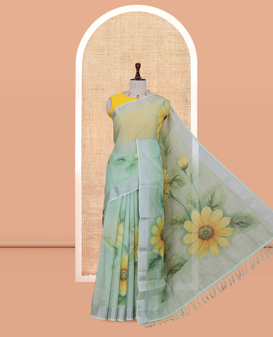 Green Linen Cotton Saree, Beautified with a Floral Print, a Subtle Border, and a Matching Blouse