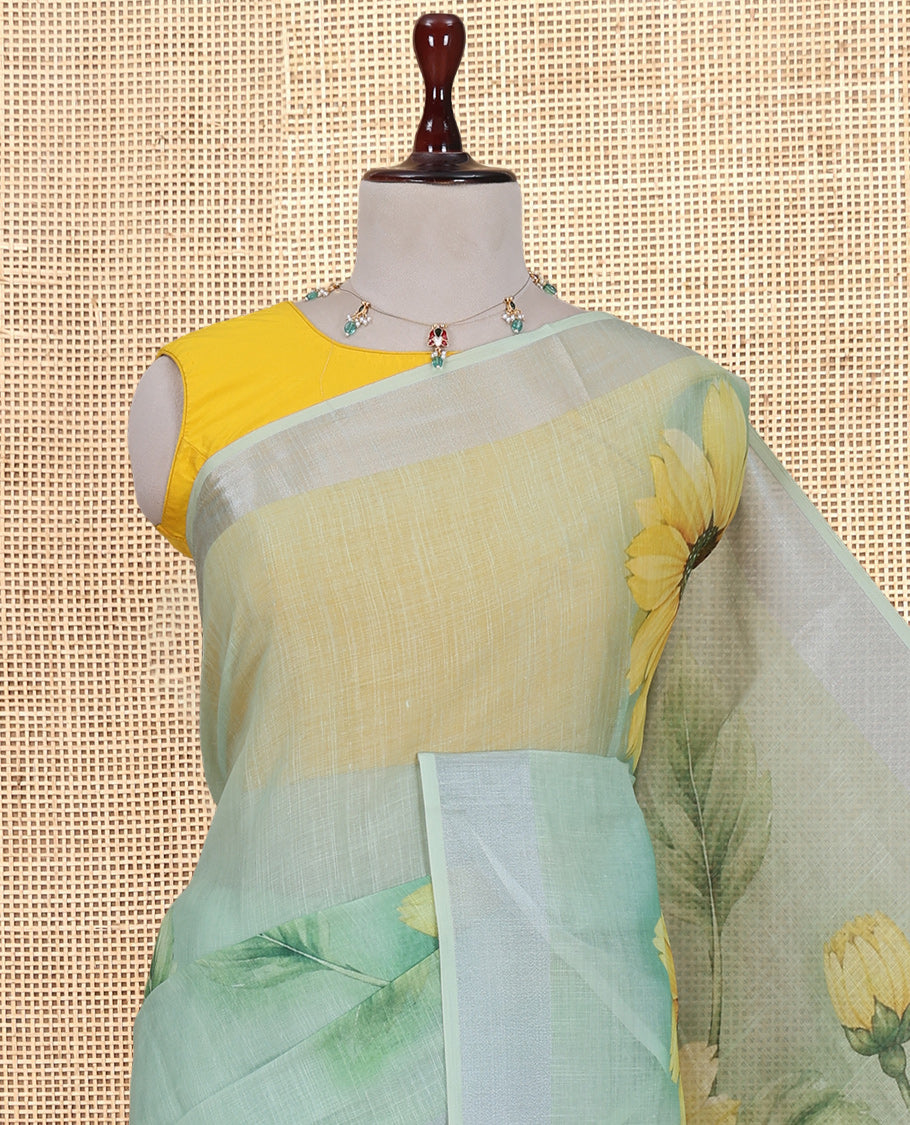 Green Linen Cotton Saree, Beautified with a Floral Print, a Subtle Border, and a Matching Blouse