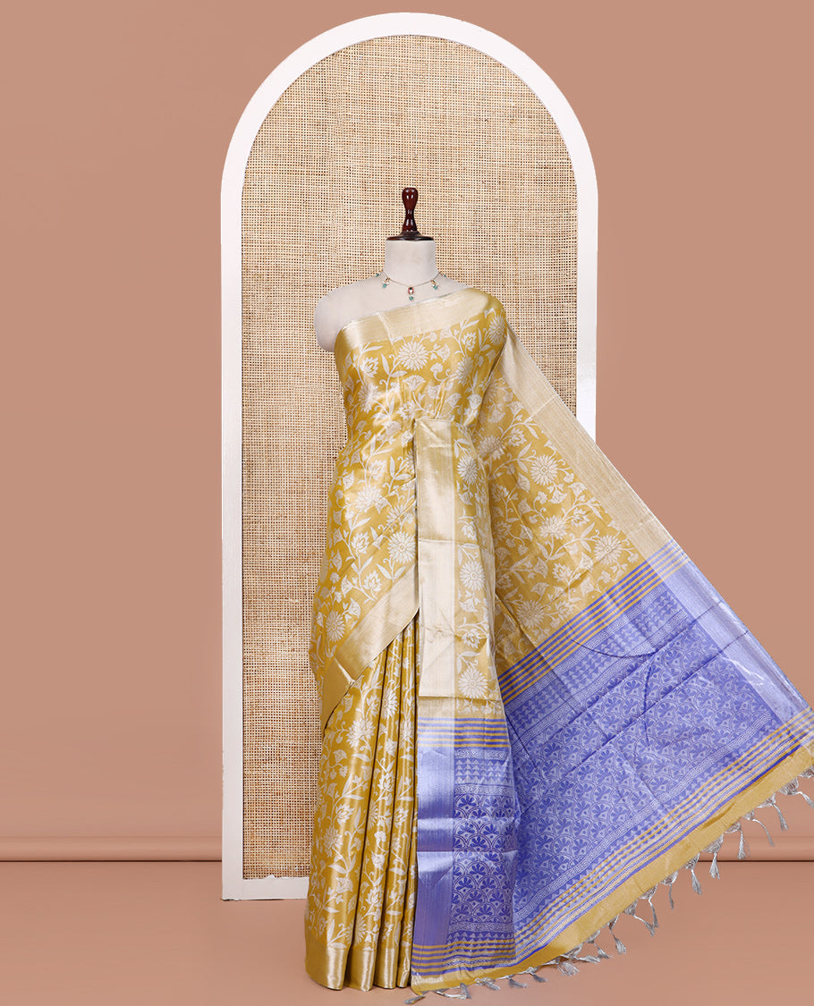 Yellow Tissue Cotton Saree Features Floral Vine Design, a Zari Border, Contrast Intricate Pallu, and a Contrast Blouse