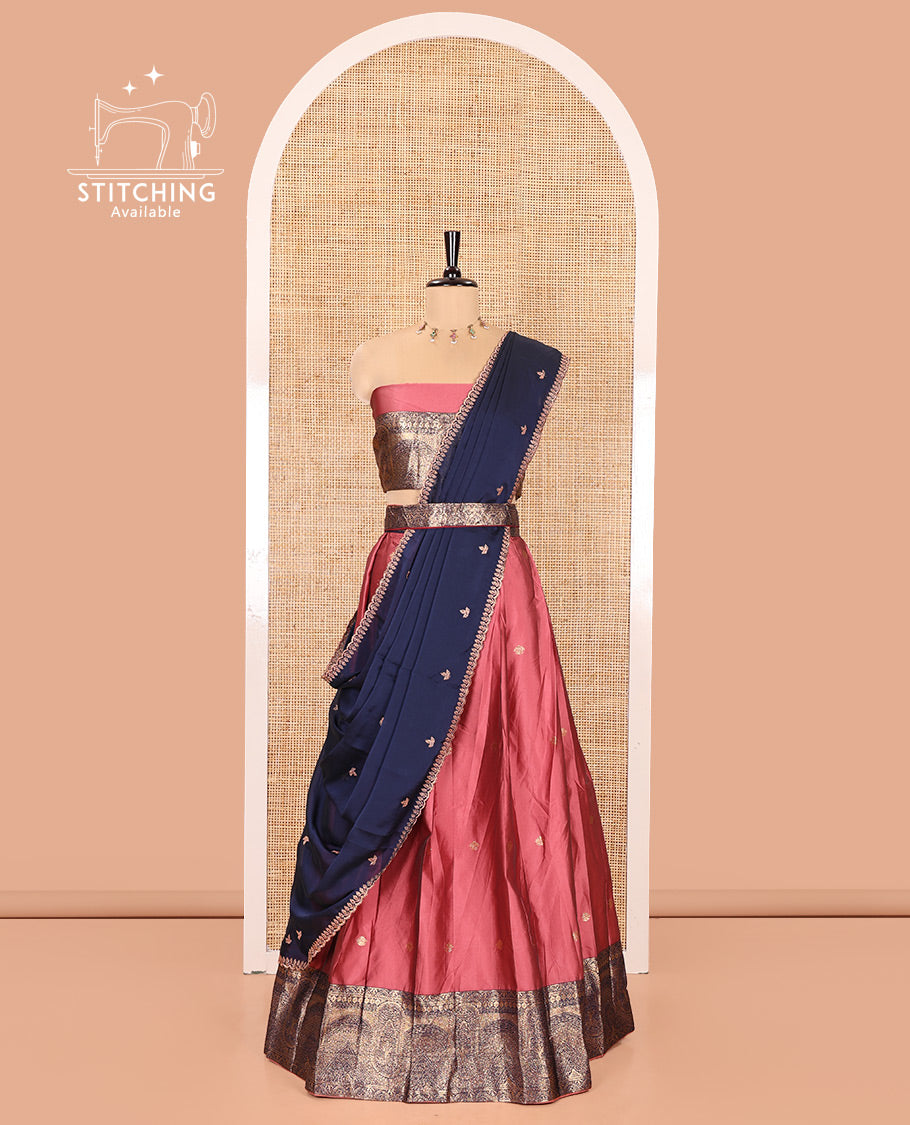 Pink and Blue Semi-Banarasi Half-Saree, Delicately Decked up with Zari Buttas on Its Skirt, Complemented by a Contrast Geometric Patterns Zari Woven Border, Paired with a Matching Blouse, and a Contrast Satin Georgette Embroidered Scallop Dhavani