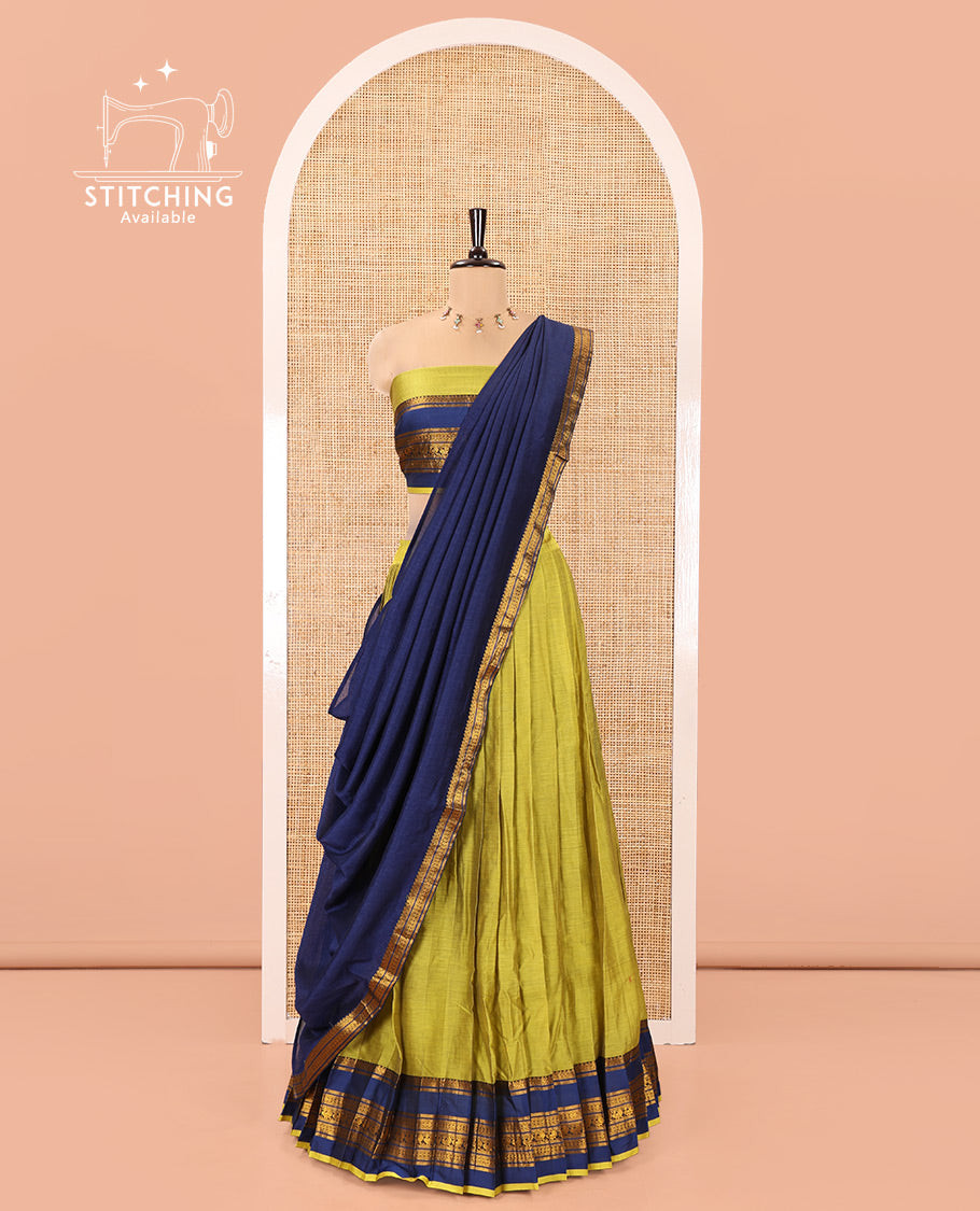 Liril Green-Royal Blue Mercerised Cotton Half-Saree Features Plain with Contrast Traditional Zari Varisai Pettu Annam-Motif Bordered Skirt, Paired with a Matching Blouse, and Comes with a Contrast Zari-Bordered Dhavani