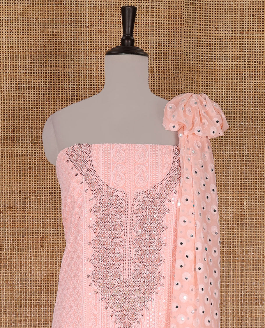 Peach material churidar set, stone work with Schiffli style embroidered georgette top, American Crape bottom, and polka dotted printed mirror work dupatta