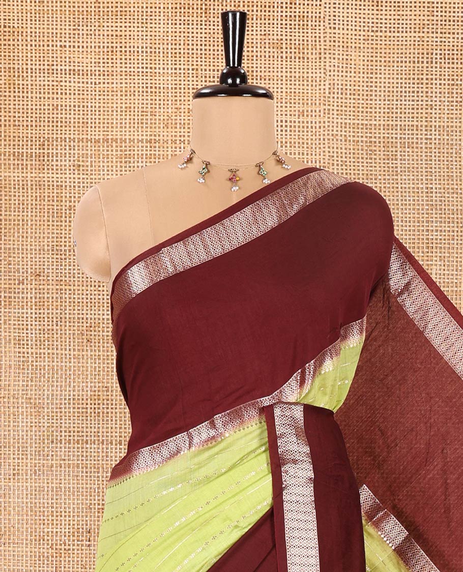 Elaichi Green Assam Silk Saree, Embellished with Horizontal Zari Stripes All Over Its Body, Complemented by a Contrast Traditional Zari Design Rettai Pettu Border, Grand Zari Striped Pallu, and Paired with a Contrast Blouse