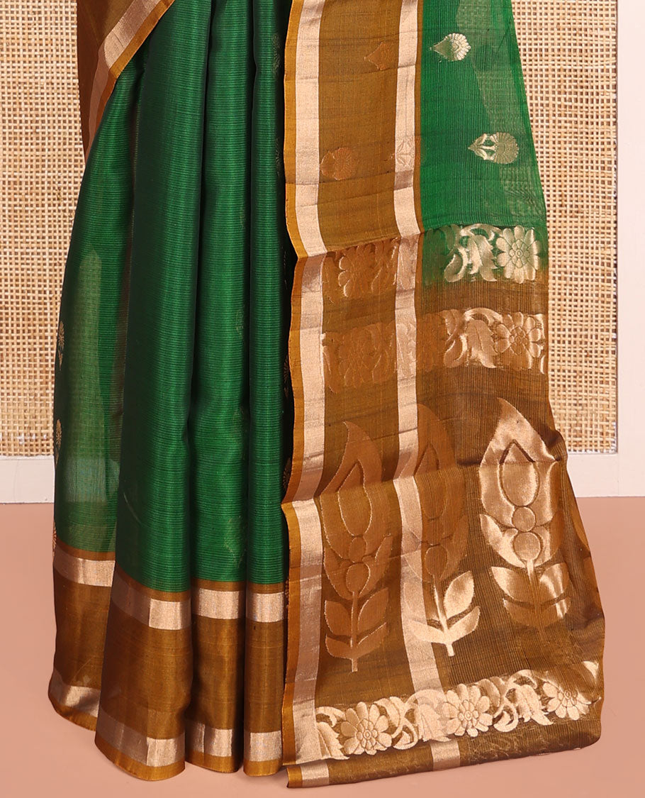 Green Silk Cotton Saree, Spotlighted with Floral Zari Buttas All Over Its Body, Complemented by a Contrast Zari Design Border, Pallu Features Floral and Paisley Designs, and Paired with a Contrast Blouse