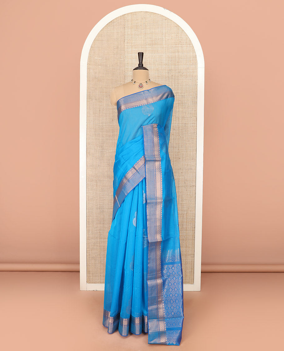 Blue Silk Cotton Saree Bedecked with Zari Buttas All Over the Body, Highlighted with Contrast Traditional Zari Border, Contrast Pallu Elevated with Jaal Design, and Paired with a Contrast Blouse